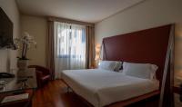 Łóżko lub łóżka w pokoju w obiekcie Hilton Garden Inn Florence Novoli