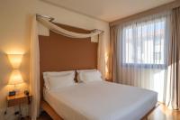 Łóżko lub łóżka w pokoju w obiekcie Hilton Garden Inn Florence Novoli