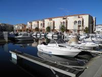 a group of boats docked in a marina at Appartement Sète, 2 pièces, 4 personnes - FR-1-338-136 in Sète