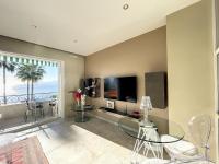a living room with a view of the ocean at Appartement Cannes, 2 pièces, 2 personnes - FR-1-470-27 in Cannes