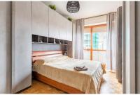 A bed or beds in a room at Appartamento Milano