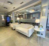 Postel nebo postele na pokoji v ubytování SM Hotel Sant Antoni
