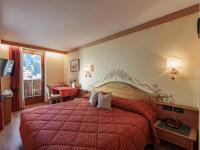 Hotel Garnì La Montanaraにあるベッド