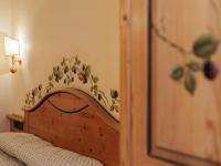 Hotel Garnì La Montanaraにあるベッド
