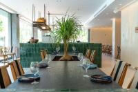 Posezení v ubytování Motto By Hilton Tulum