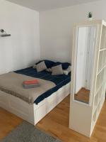 Posteľ alebo postele v izbe v ubytovaní Apartament Francuska Pokoje Rooms