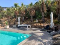 Bazén v ubytovaní Appartement - Maison "Le pied à terre 1" PORTICCIO alebo v jeho blízkosti