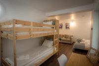 Postel nebo postele na pokoji v ubytování Forest Spa House
