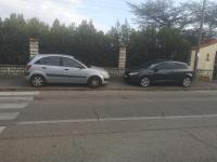 two cars parked on the side of a street at Chez Mélanie in Marseille