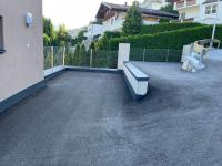 a bench sitting on top of a patio at Apart Finazzer in Wenns