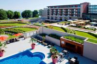 an aerial view of a hotel with a pool at Hilton Evian Les Bains in Évian-les-Bains