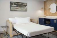 Ein Bett oder Betten in einem Zimmer der Unterkunft Hilton Garden Inn Annapolis Downtown