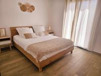 Posteľ alebo postele v izbe v ubytovaní Résidence Villas Chléa