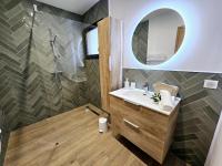 Kúpeľňa v ubytovaní Résidence Villas Chléa