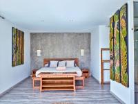 A bed or beds in a room at Can Do It