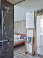 A bed or beds in a room at Can Do It