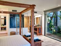 A bed or beds in a room at Can Do It