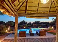 The swimming pool at or close to Can Do It