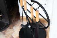 a group of knives hanging from a stand next to a stove at Lucija in Lovinac