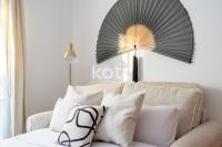 Posteľ alebo postele v izbe v ubytovaní Koti Rentals - Sandy Beach Apartment