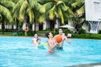 a group of people playing basketball in a swimming pool at Vinpearl Resort & Spa Phu Quoc in Phú Quốc