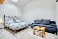 Postel nebo postele na pokoji v ubytování Apartmány Svatošské skály