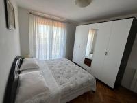 Posteľ alebo postele v izbe v ubytovaní Apartments Dujmović