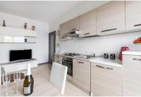 A kitchen or kitchenette at Appartamento Milano