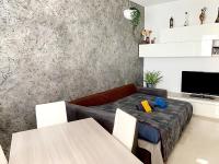A television and/or entertainment centre at Appartamento Milano