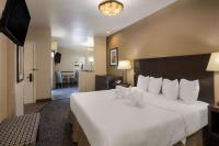 Ein Bett oder Betten in einem Zimmer der Unterkunft Best Western Plus Canyonlands Inn