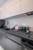 Kuchyň nebo kuchyňský kout v ubytování Top-Notch location, an Exceptionally Stylish flat