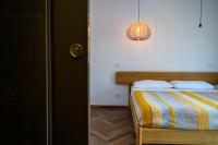 Łóżko lub łóżka w pokoju w obiekcie Vetriera41