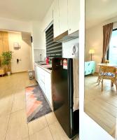 Netflix-Seaview-SunsetView-PuteriBeach-Mutiara Beach Resort Melakaにあるキッチンまたは簡易キッチン