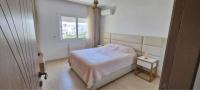 Postel nebo postele na pokoji v ubytování Super appartement avec 5 piscines en résidence