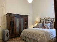 Postel nebo postele na pokoji v ubytování Casa Colonial El Indiano