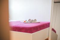 Posteľ alebo postele v izbe v ubytovaní Apartman Lara