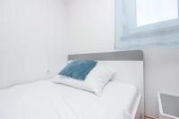 Posteľ alebo postele v izbe v ubytovaní Apartman Lara