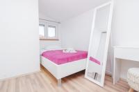 Posteľ alebo postele v izbe v ubytovaní Apartman Lara