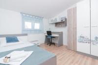 Posteľ alebo postele v izbe v ubytovaní Apartman Lara