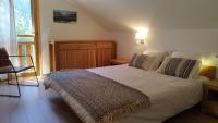 Łóżko lub łóżka w pokoju w obiekcie Chalet Le Refuge