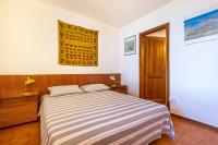A bed or beds in a room at Villa Franca San Zeno