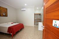 Cama ou camas em um quarto em Pousada e Restaurante Paraíso Natural
