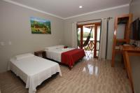 Cama ou camas em um quarto em Pousada e Restaurante Paraíso Natural