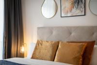 Postel nebo postele na pokoji v ubytování Maracoon - Loft Apartments Essen City Center