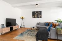 TV a/nebo společenská místnost v ubytování Maracoon - Loft Apartments Essen City Center
