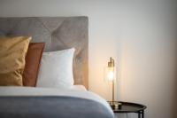 Postel nebo postele na pokoji v ubytování Maracoon - Loft Apartments Essen City Center