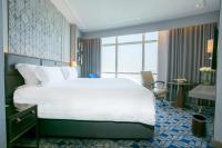 Ein Bett oder Betten in einem Zimmer der Unterkunft Centara Grand At CentralWorld