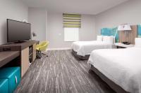 Ein Bett oder Betten in einem Zimmer der Unterkunft Hampton Inn Miami Airport East