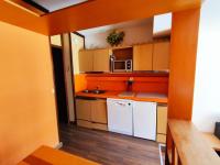 Kuchyňa alebo kuchynka v ubytovaní Appartement 3 chambres au pied des pistes avec garage et Wi-Fi - FR-1-292-186