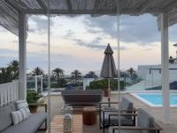 The swimming pool at or close to Pasitoblanco Porto Mare 7 Seaview Villa private heated pool